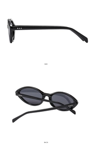 Side and back view of elegant black cat-eye sunglasses with slim temples and oval frames