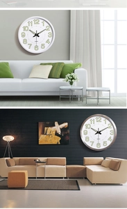 Close-up of 12-inch luminous wall clocks in white and silver finishes for modern living rooms
