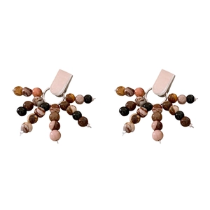Vintage style drop earrings featuring natural stone beads in a unique fan-shaped design