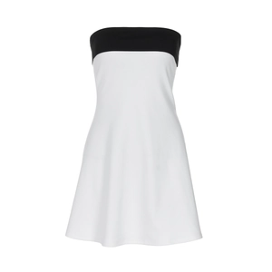 Detail of color block tube dress showing black bodice and white body with smooth texture