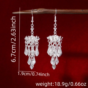 Detailed size chart of vintage bohemian silver flower earrings with long tassels