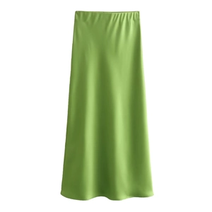 Detail of light green high-waisted satin midi skirt with glossy texture and elegant drape