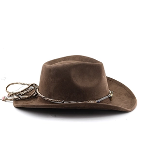 Detailed texture of brown faux suede western cowboy hat with woven band and blue bead