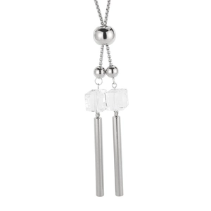 Modern silver stainless steel tassel necklace with transparent beads on white background