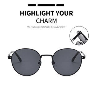 Detailed view of the durable metal hinge and sleek temple structure of round sunglasses