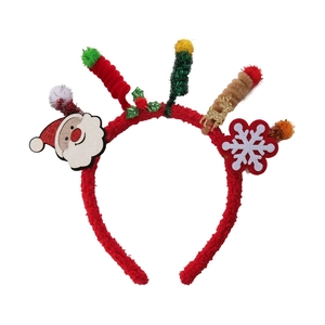 Close-up of red plush headband with Santa Claus, gold reindeer and Christmas tree decor