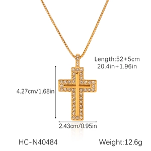Detail view of 18K gold stainless steel cross pendant necklace with size and weight specs