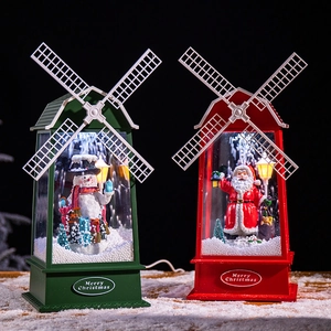Lanternes de Noël en forme de moulin à vent rouge et vert avec Père Noël et bonhomme de neige