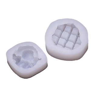 Silicone candle molds for waffle and swirl bread shapes, ideal for DIY soap and resin crafts