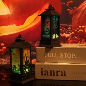 Luminous Halloween lanterns with pumpkin designs and warm LED light for festive parties