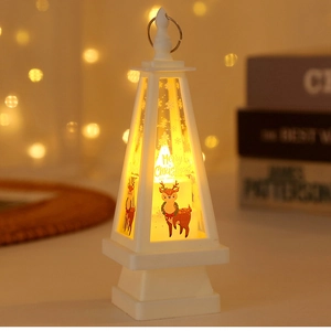 Detail view of white LED Christmas lantern with reindeer print and warm glowing light