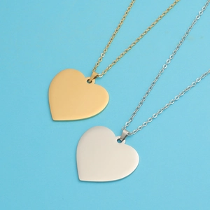 Polished stainless steel heart-shaped pendants in gold and silver on O-chains