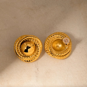 Detail of 18k gold plated stainless steel stud earrings with twisted rope texture edges