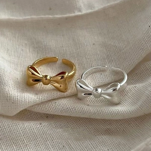 Elegant adjustable S925 sterling silver bow rings in gold and silver finishes