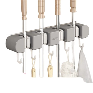 Wall-mounted mop holder with 4 slots and 5 hooks for bathroom storage organization