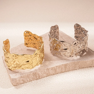 Artistic hammered texture wide open cuff bracelet in gold and silver metal finishes