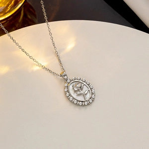Elegant silver necklace with rose shell oval pendant and freshwater pearl border