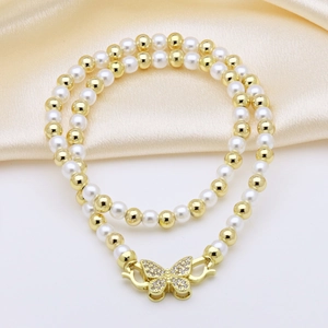 Double-layered natural pearl necklace with golden beads and crystal butterfly pendant