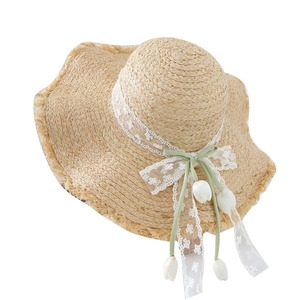 French straw sun hat with lace ribbon, green bow and tulip charm for beach vacations