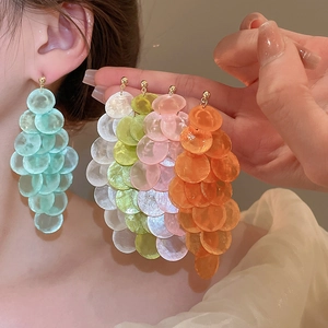 Bohemian geometric shell disc tassel earrings in multiple colors for beach vacation vibes