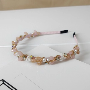 Detail of pink satin headband with marquise resin beads, pearls and crystals