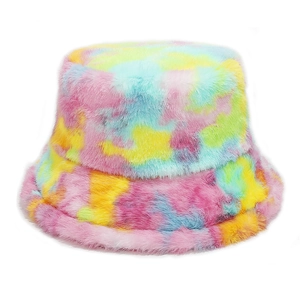 Detail of colorful tie-dye faux fur bucket hat showing soft rainbow plush texture
