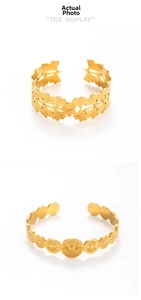 Detailed view of adjustable gold-plated stainless steel gingko leaf and sunburst bracelets
