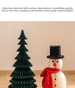 Detail of paper honeycomb Christmas tree and snowman with scarf for holiday decoration