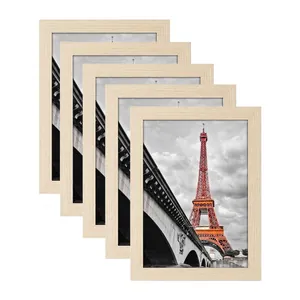 Five-piece minimalist light wood photo frame set with artistic architectural photography