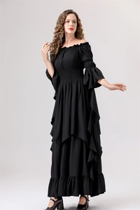 Detail of black Renaissance dress with off-shoulder neckline and ruffled tiered skirt