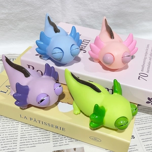 Pop-eye axolotl stress relief toys in four colors on decorative books, 80-100 characters
