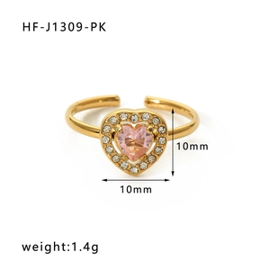 Detailed view of golden heart-shaped ring with 10mm pink gemstone and cubic zirconia accents