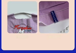 Detail of reinforced woven handles and elastic storage strap on light purple nylon tote