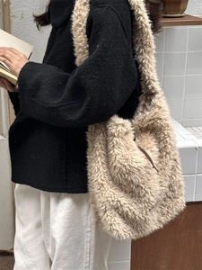 Chic beige lamb wool tote bag with classic plaid lining and large shoulder capacity