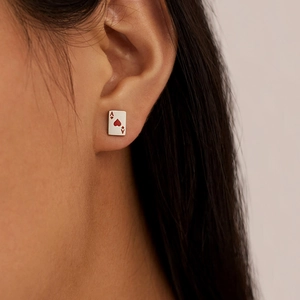 Close-up of Ace of Hearts poker card stud earring in silver stainless steel on model