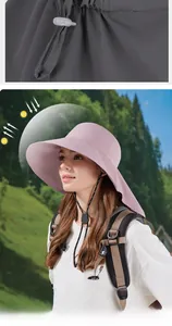 Detail of pink wide-brim sun hat with adjustable windproof cord and UV protection fabric
