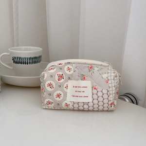 Quilted floral small square bag with French label and patchwork design in cream