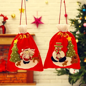 Christmas stockings gift bags with Santa and Snowman embroidery on festive velvet fabric