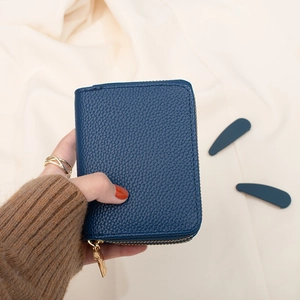 Minimalist navy blue lychee pattern leather wallet with premium gold zipper closure