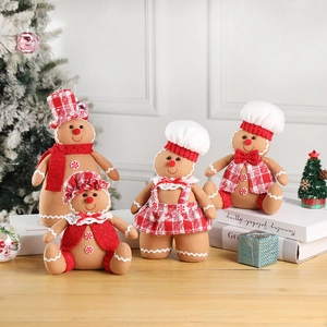 Detailed close-up of Christmas gingerbread man plush dolls in red plaid waffle fabric texture