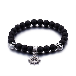Vintage nautical beaded bracelet with matte black stones and silver anchor charms