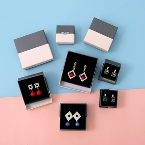 Minimalist color-block jewelry boxes with elegant pearl and diamond earrings set