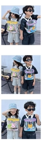 Detail of transparent PVC kids backpack showing colorful cartoon character decorations