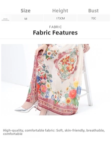 Detail of floral chiffon dress fabric featuring deep red tulip patterns and soft texture