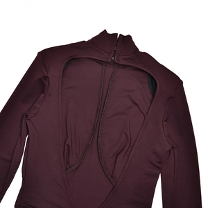 Detailed back view of dark burgundy high-neck dress featuring a stylish open back design