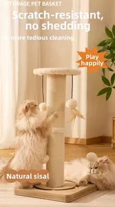 Close-up of natural sisal rope scratching post with feather and plush ball cat toys