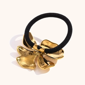 Élastique à cheveux élégant en acier inoxydable doré 18K avec fleur de trèfle à quatre feuilles