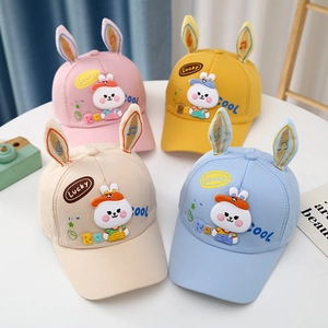 Set of four cute baby baseball caps with 3D rabbit ears in pink, blue, beige, and yellow