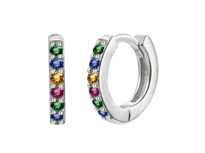 Macro shot of silver hoop earrings featuring colorful round zirconia gemstones