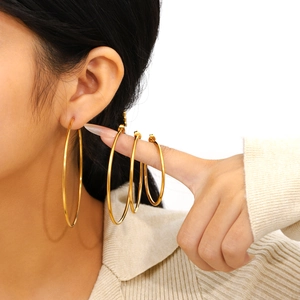 Minimalist gold-plated stainless steel C-shaped hoop earrings in four different sizes